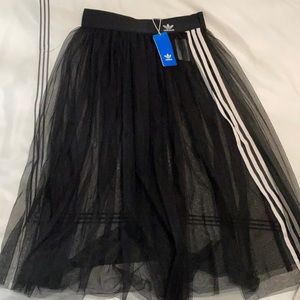 Black tulle adidas skirt with tags attached. Size medium
